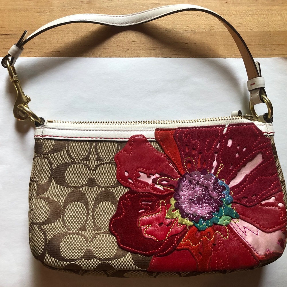 Authentic Coach Poppy appliqué clutch. Like new
